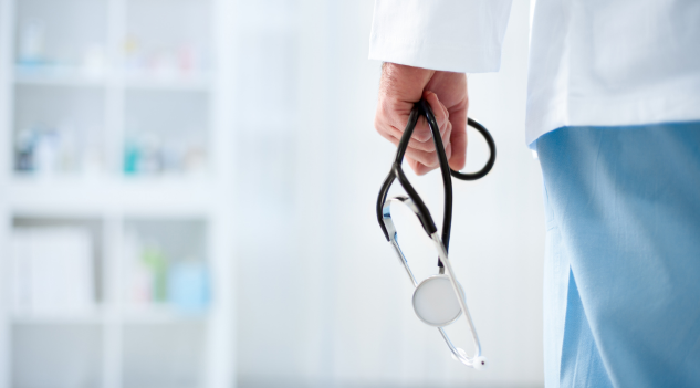 showing medical doctor holds steroscope by his right