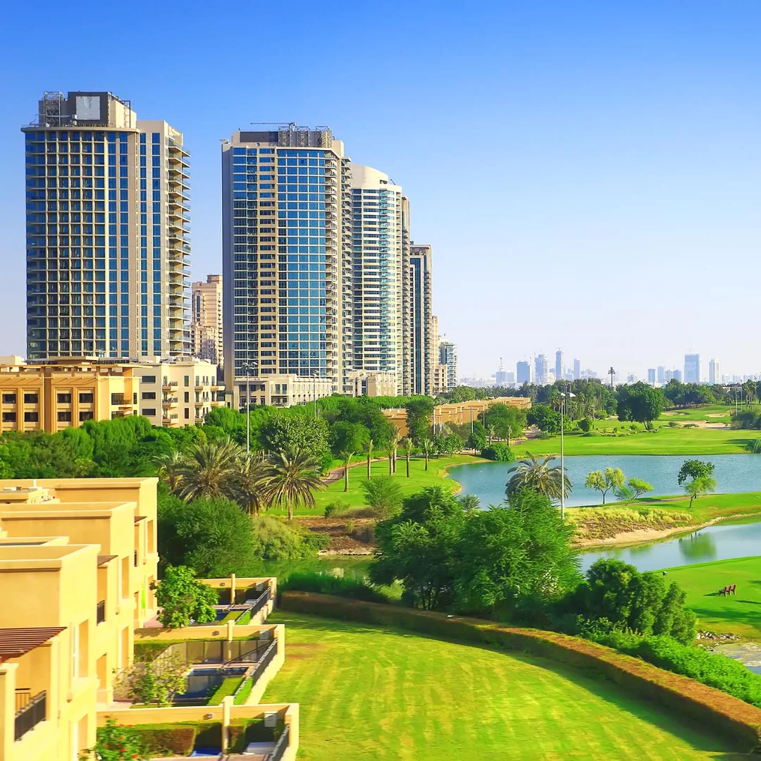 picture showing buildings and green gardens also lakes in sports city area dubai